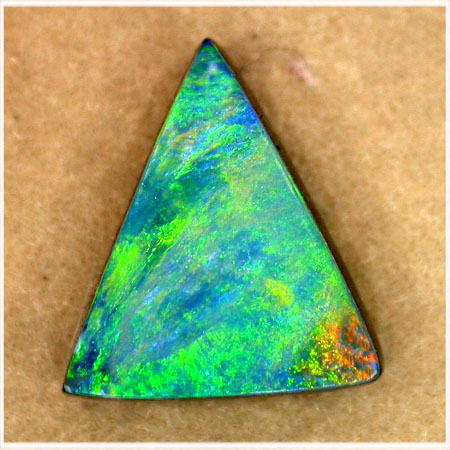 image of a triangular opal stone